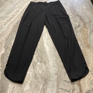James Icon black dress pants with covered buttons on ankle